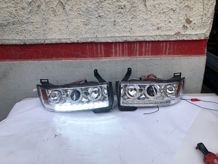 94-01 DODGE RAM 1500 DODGE RAM 94-02 2500 3500 HALO RING CHROME HOUSING AMBER CORNER HEADLIGHTS