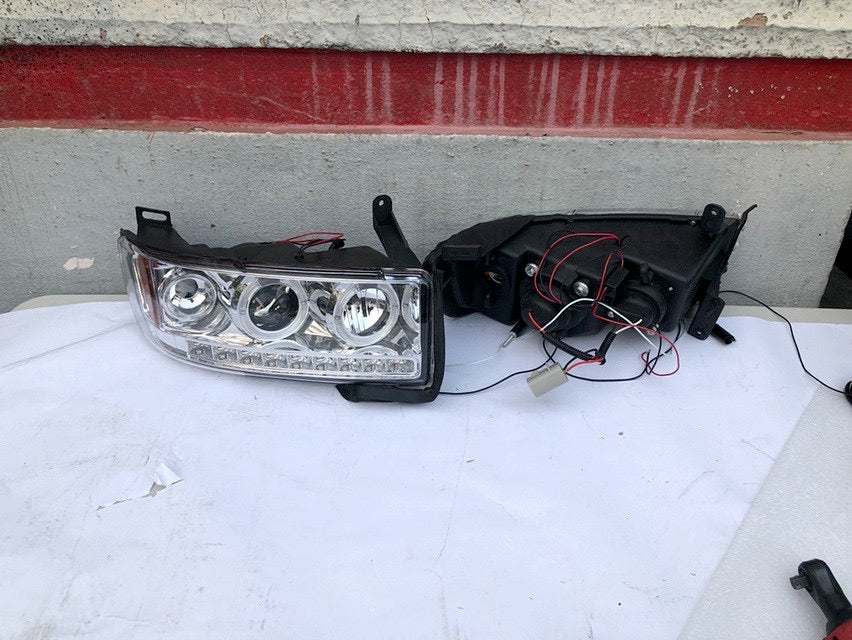 94-01 DODGE RAM 1500 DODGE RAM 94-02 2500 3500 HALO RING CHROME HOUSING AMBER CORNER HEADLIGHTS
