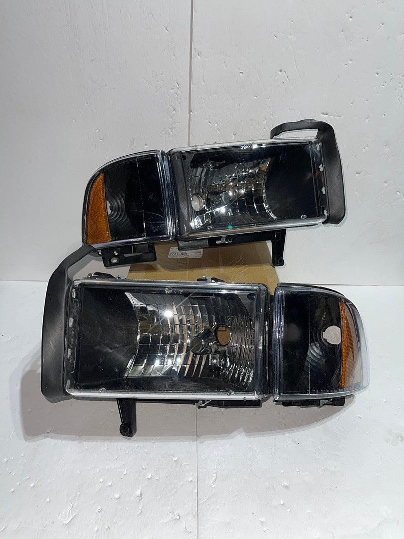 REFURBISHED 94-01 DODGE RAM BLACK HOUSING AMBER CORNER HEADLIGHTS