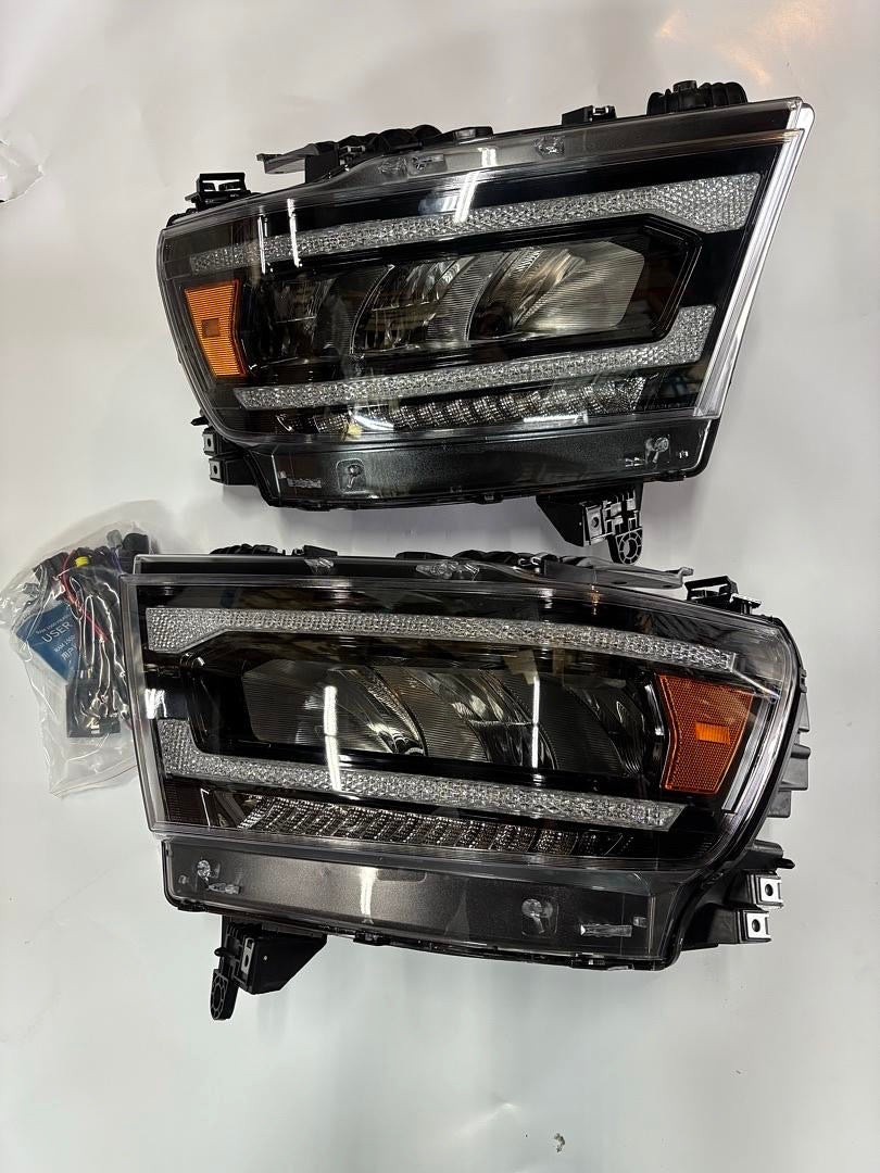 19-24 DODGE RAM 1500 TRADESMAN HFE, BIGHORN, LARAMIE, REBEL, LONE STAR W/SEQUENTIAL W/REFLECTIVE BOWL BLACK AMBER HEADLIGHTS