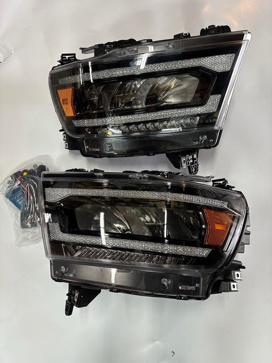 19-24 DODGE RAM 1500 TRADESMAN HFE, BIGHORN, LARAMIE, REBEL, LONE STAR W/SEQUENTIAL W/REFLECTIVE BOWL BLACK AMBER HEADLIGHTS