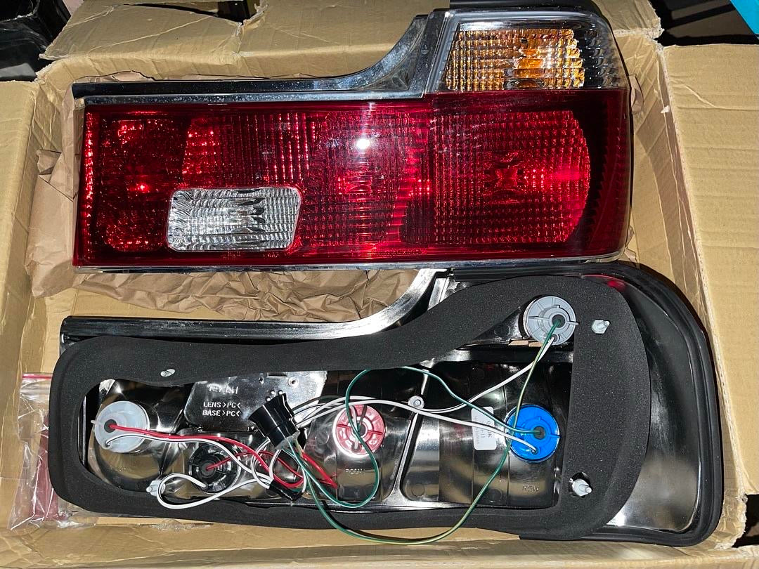 82-88 BMW 735I RED CLEAR TAILLIGHTS