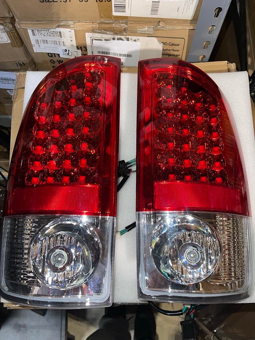 OB (LIGHT SCRATCH) 02-06 DODGE RAM CHROME / RED LED TAILLIGHTS