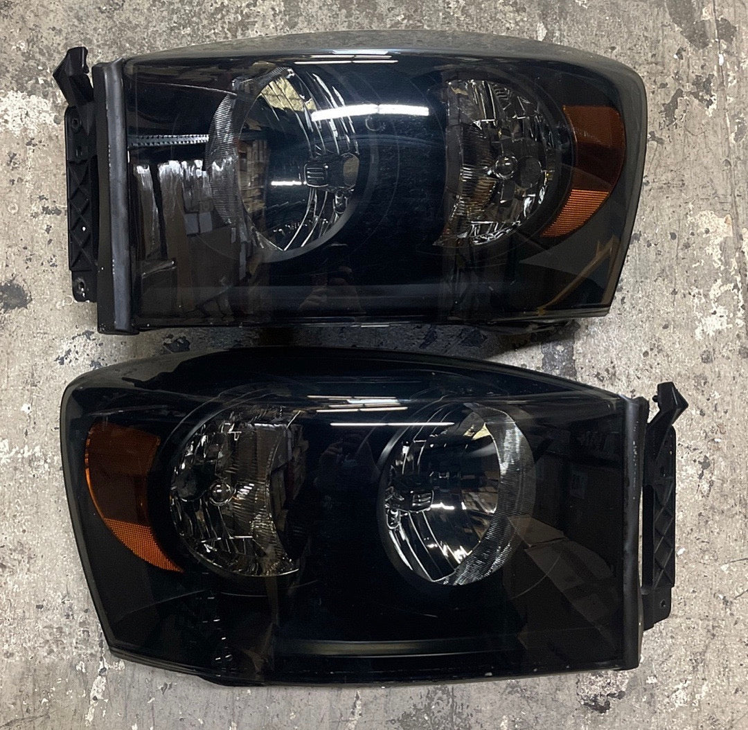 OB 06-08 DODGE RAM BLAACK SMOKED AMBER HEADLIGHT