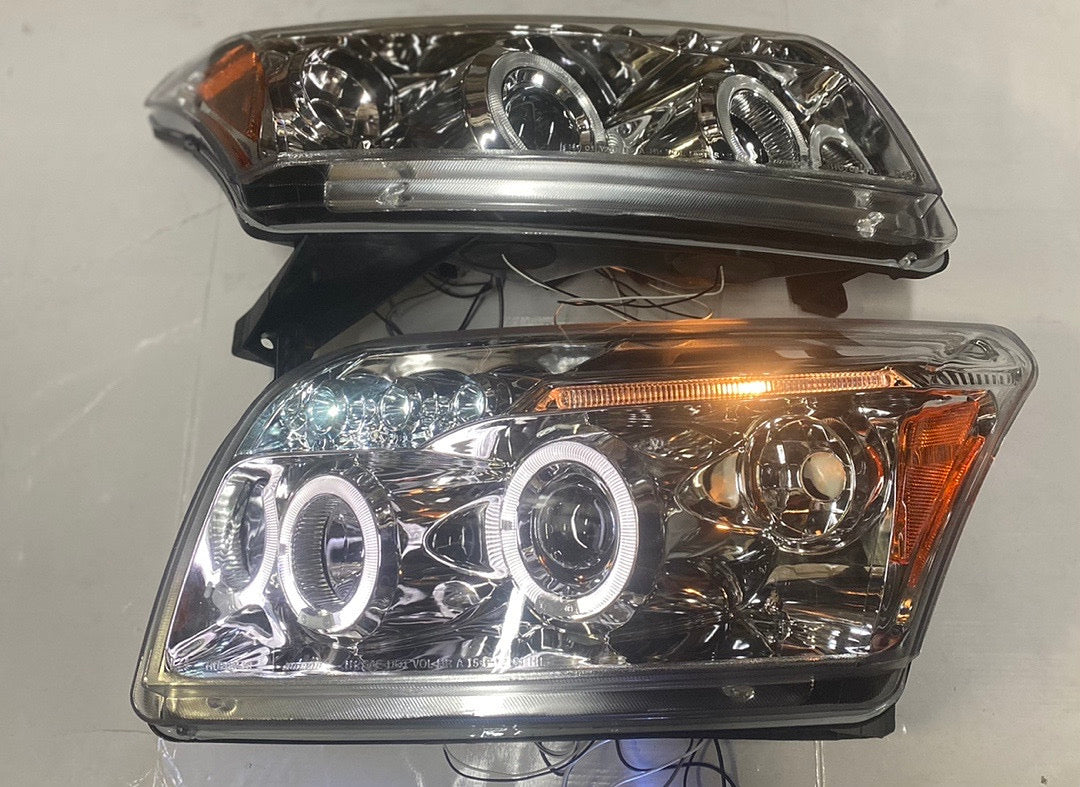 07-10 DODGE CALIBER CHROME HOUSING AMBER PROJECTOR HALOGEN HEADLIGHTS