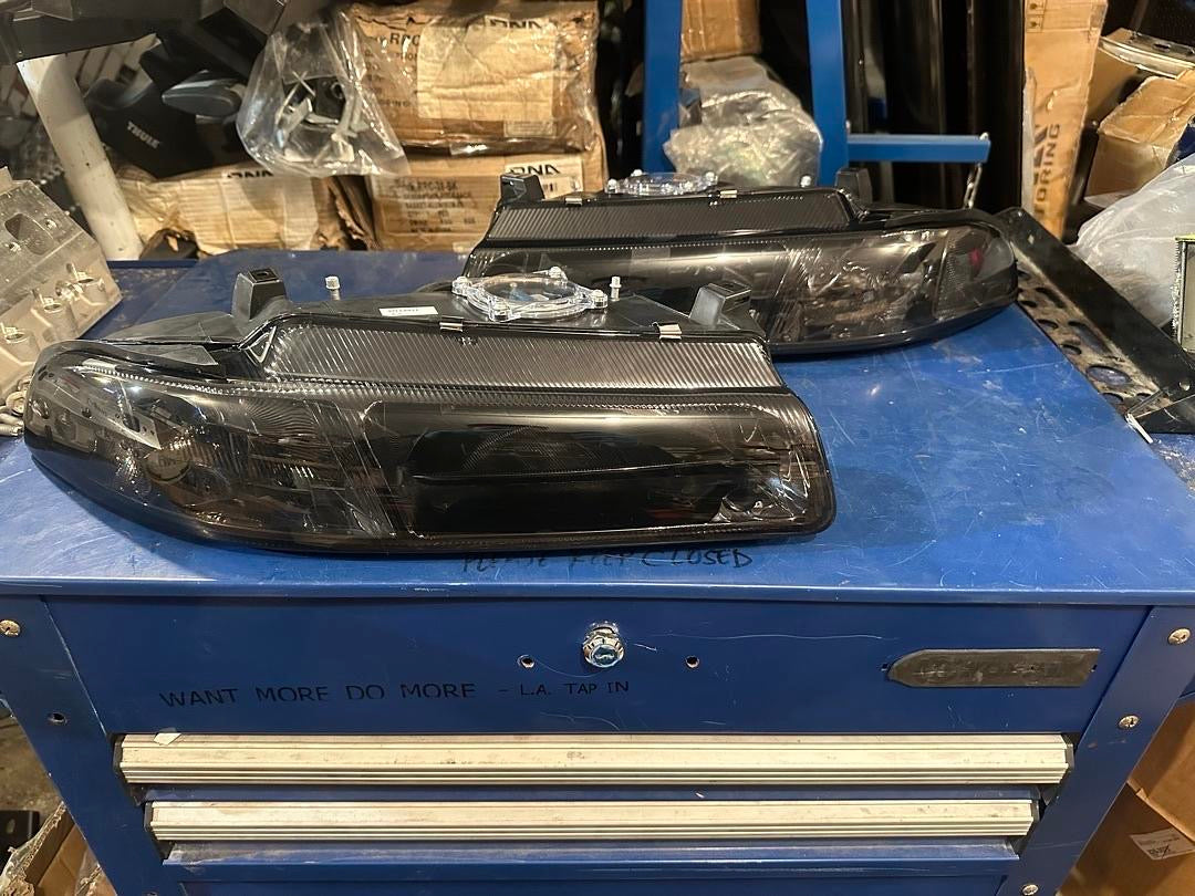 95-00 CIRRUS STRATUS SMOKED HOUSING CLEAR CORNERS HEADLIGHT PAIR ASSEMBLY
