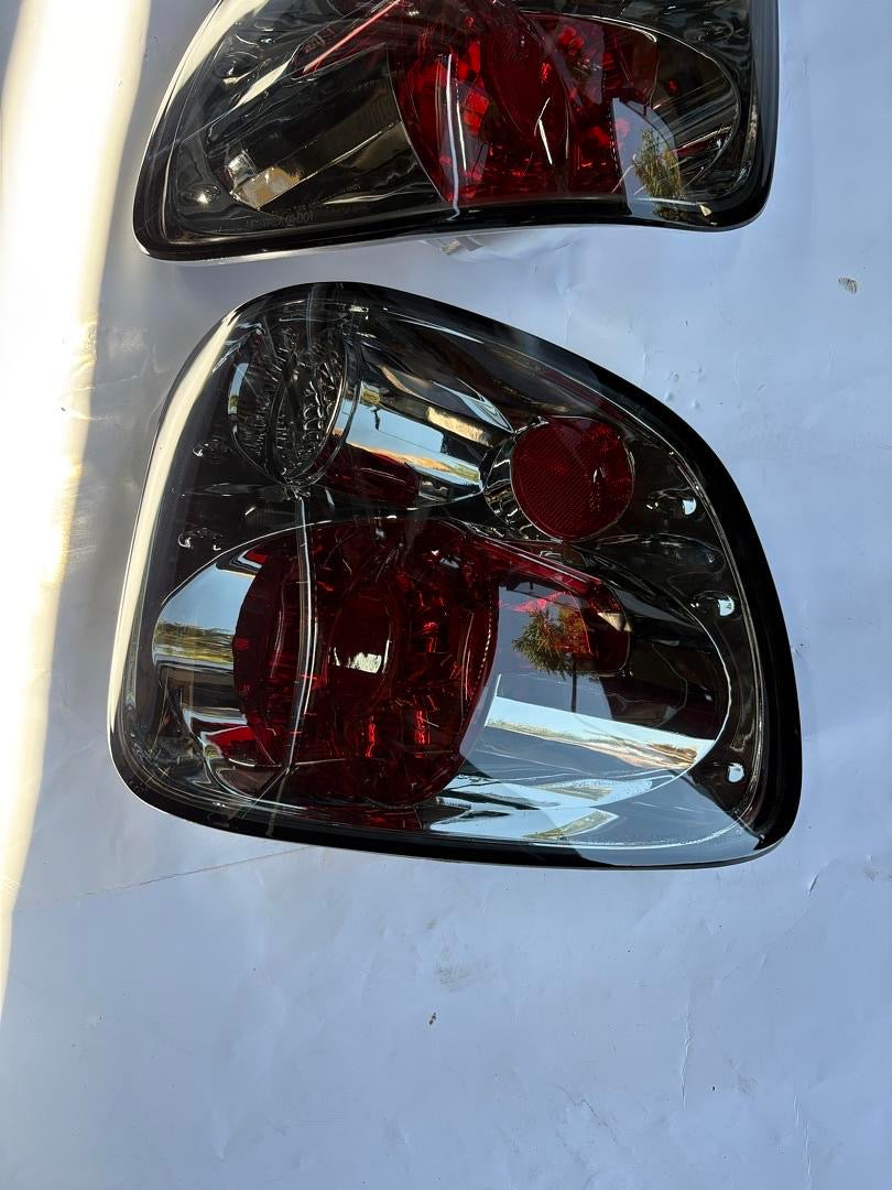 97-00 FOR FORD F-150 FLARESIDE SMOKE REAR TAIL LIGHTS PAIR