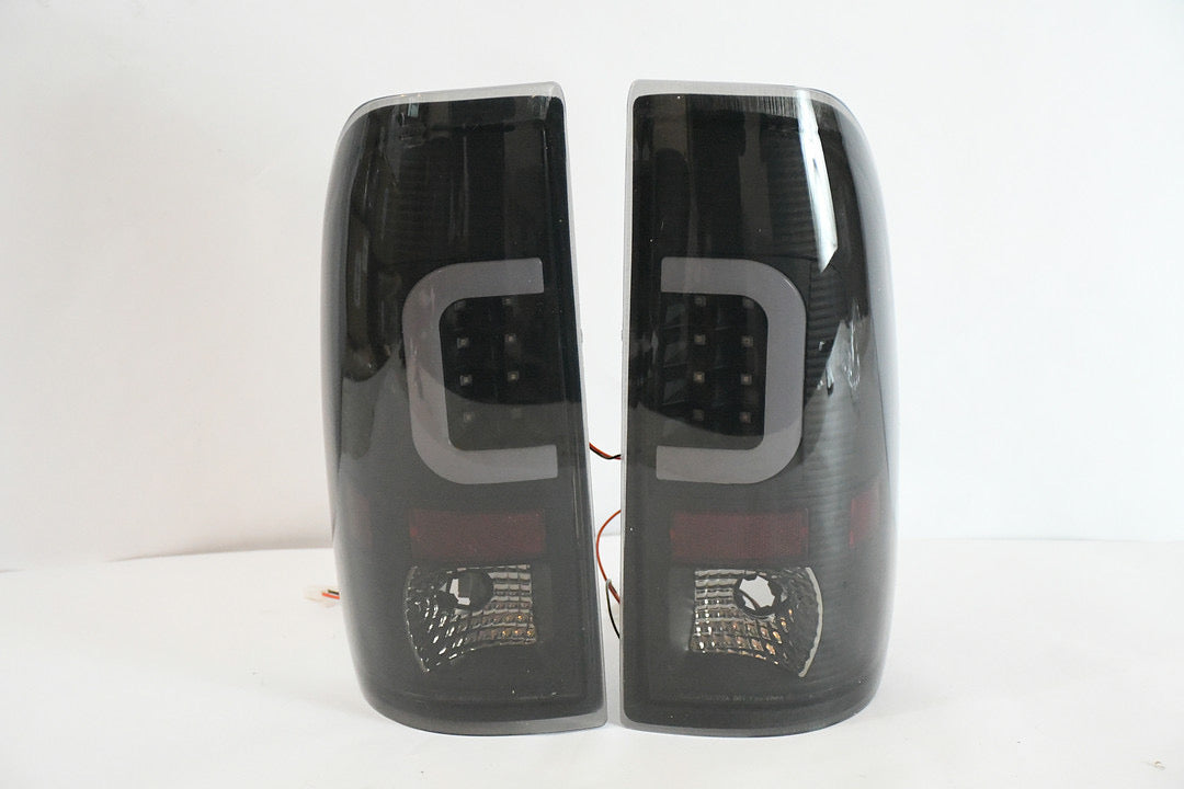 08-16 FORD F-250 / F-350 / F-450 / F-550 SUPER DUTY BLACK HOUSING AND SMOKED AND C-STYLE LED TAIL LIGHTS