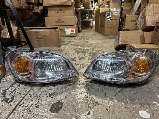 05-10 CHEVY COBALT PONTIAC G5 PURSUIT HEADLIGHTS - CHROME HOUSING CLEAR CORNER