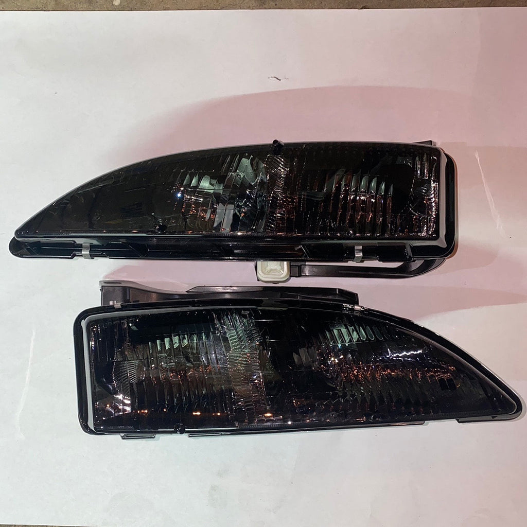 95-99 CHEVY CAVALIER PAIR SMOKED LENS CLEAR TURN SIGNAL HEADLIGHT