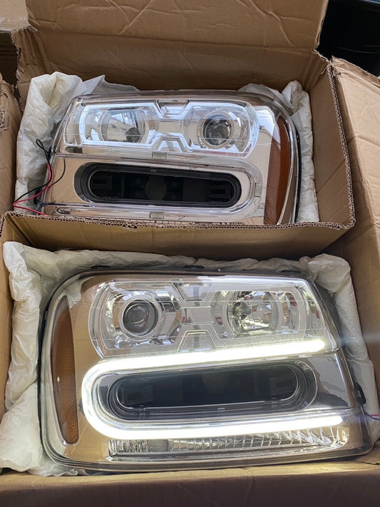 02-09 CHEVY TRAILBLAZER CHROME CLEAR HEADLIGHTS