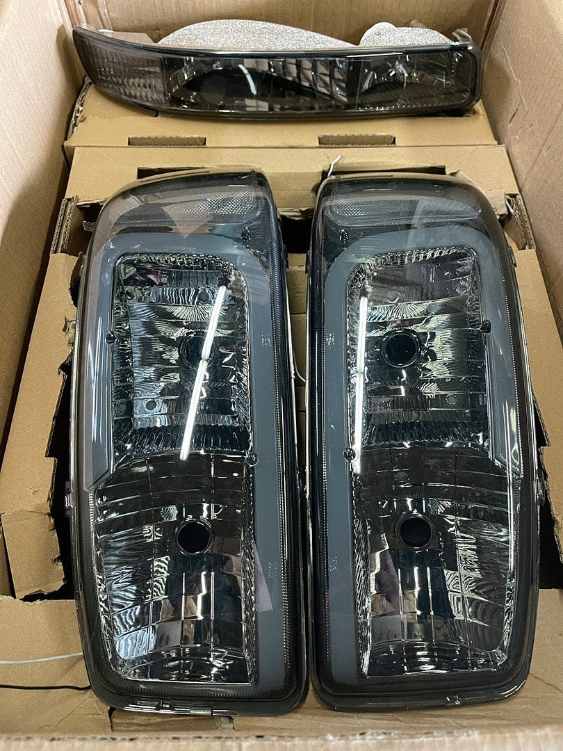 REFURBISHED 99-06 GMC SIERRA SMOKED CLEAR