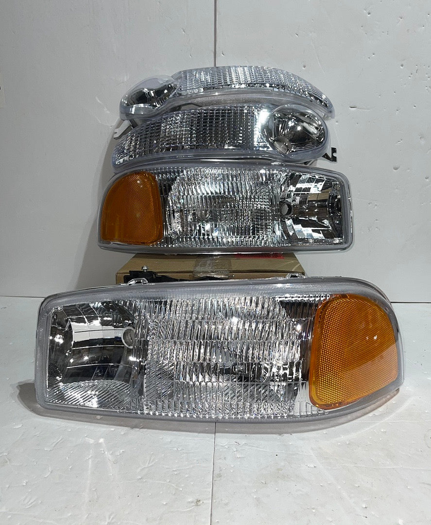 01-06 GMC DENALI CHROME HOUSING WITH AMBER REFLECTOR HEADLIGHTS OE STYLE