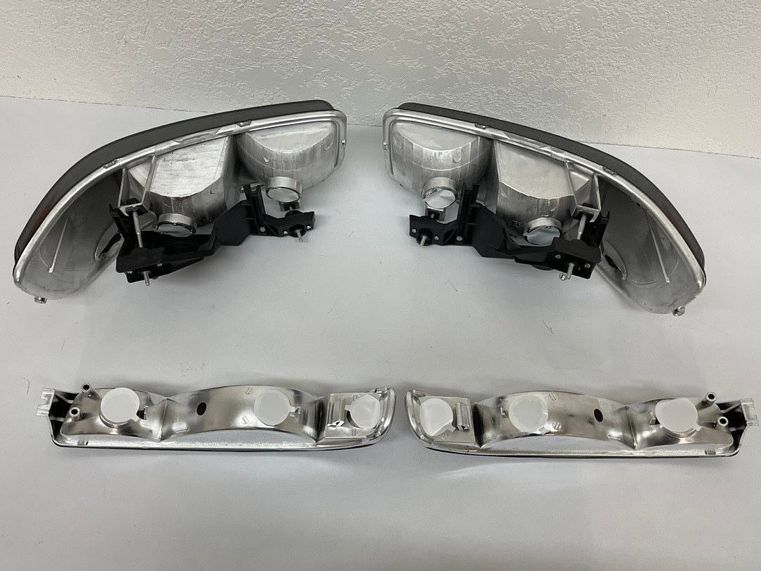 99-06 GMC SIERRA SMOKED HOUSING WITH AMBER REFLECTOR HEADLIGHTS