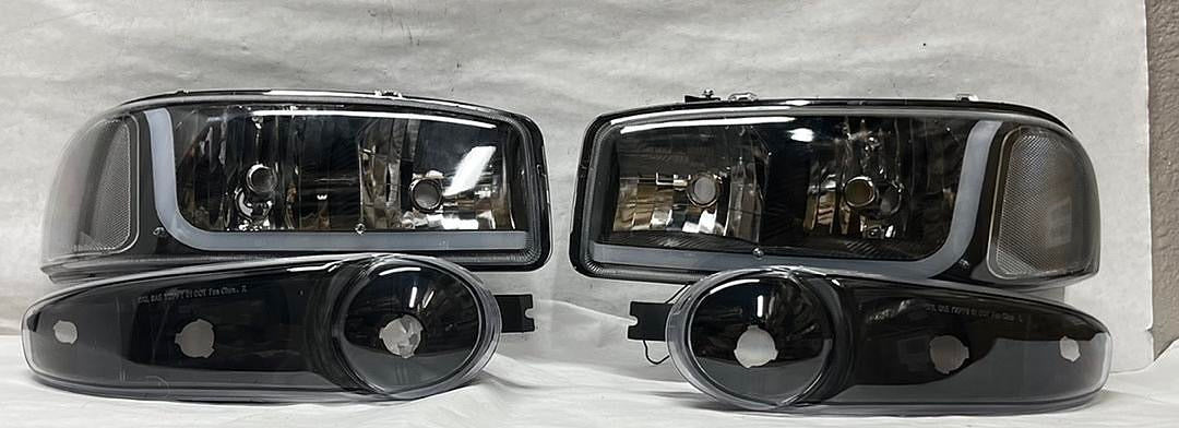 REFURBISHED 01-06 GMC DENALI BLACK CLEAR WITH LED HEADLIGHTS