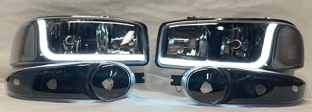 REFURBISHED 01-06 GMC DENALI BLACK CLEAR WITH LED HEADLIGHTS