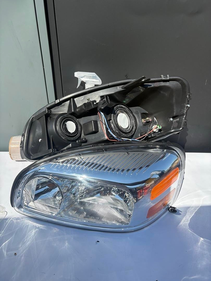 05-09 CHEVY UPLANDER CHROME AMBER HEADLIGHTS
