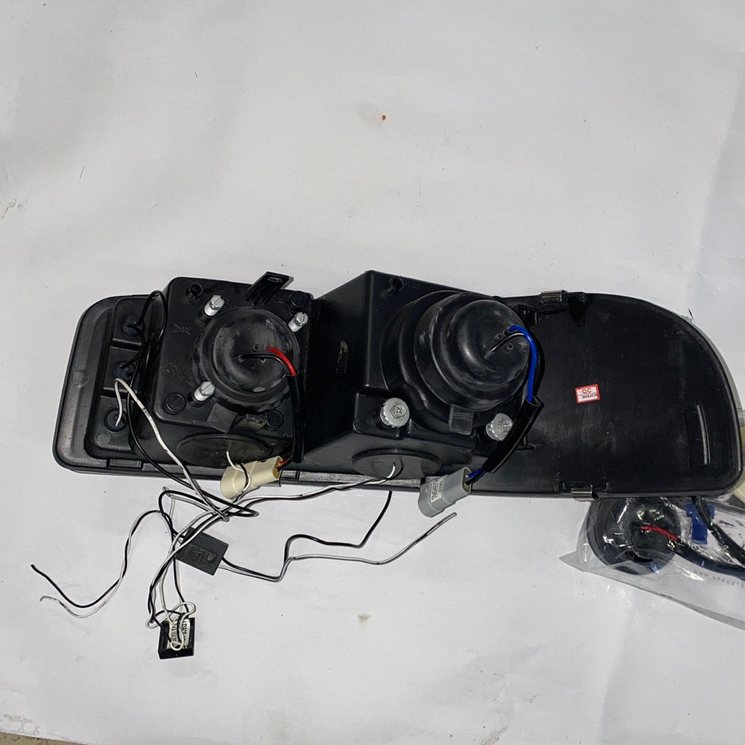 01-06 GMC DENALI HALO PROJECTORS BLACK CLEAR TOPS ONLY
