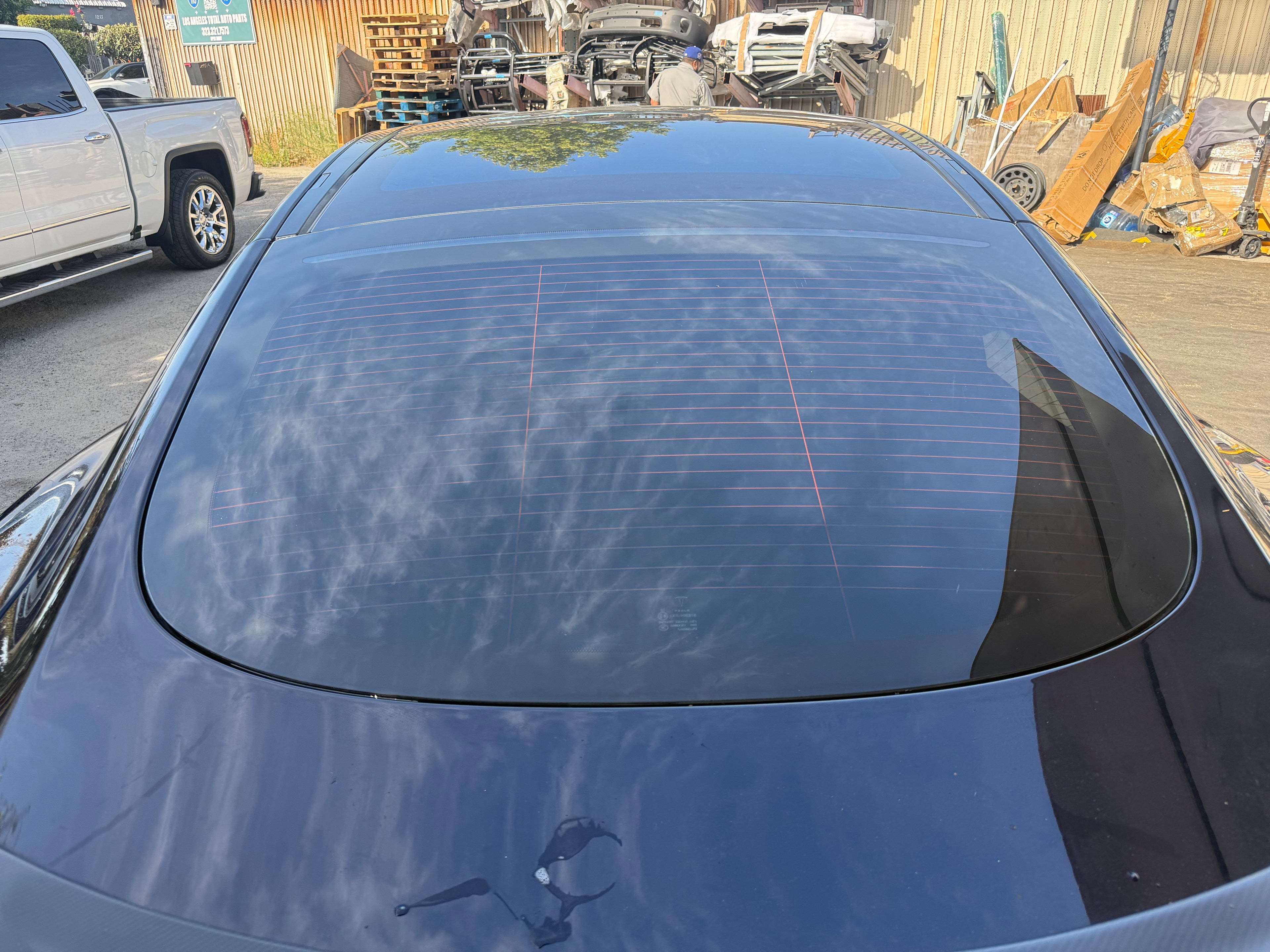 Perforated white vinyl rear window easy apply decal.