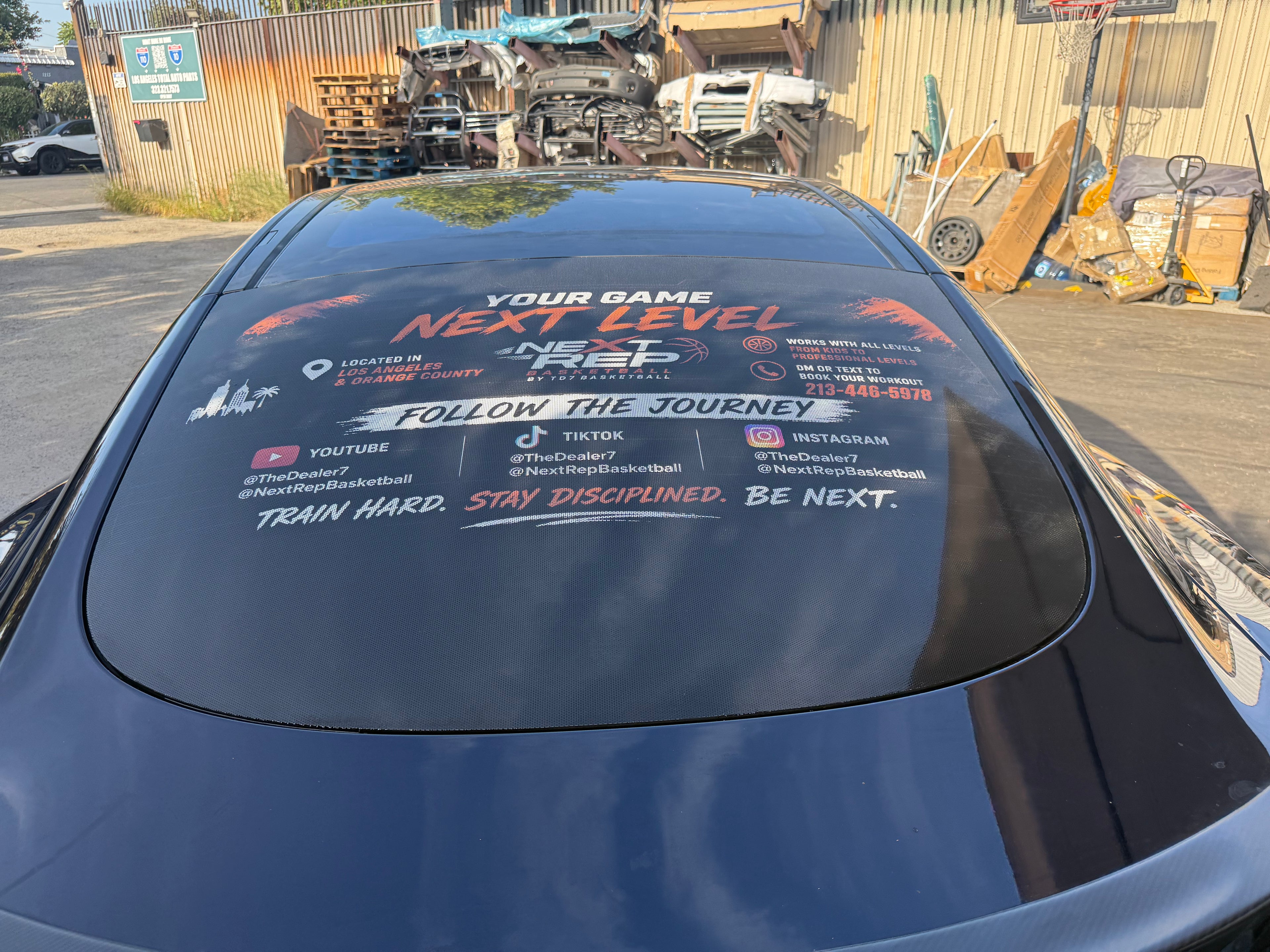 Perforated white vinyl rear window easy apply decal.