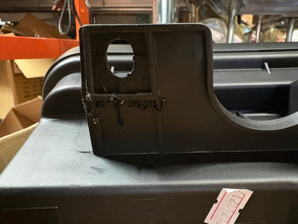 Actual item: repaired right headlight mounting area, view 2