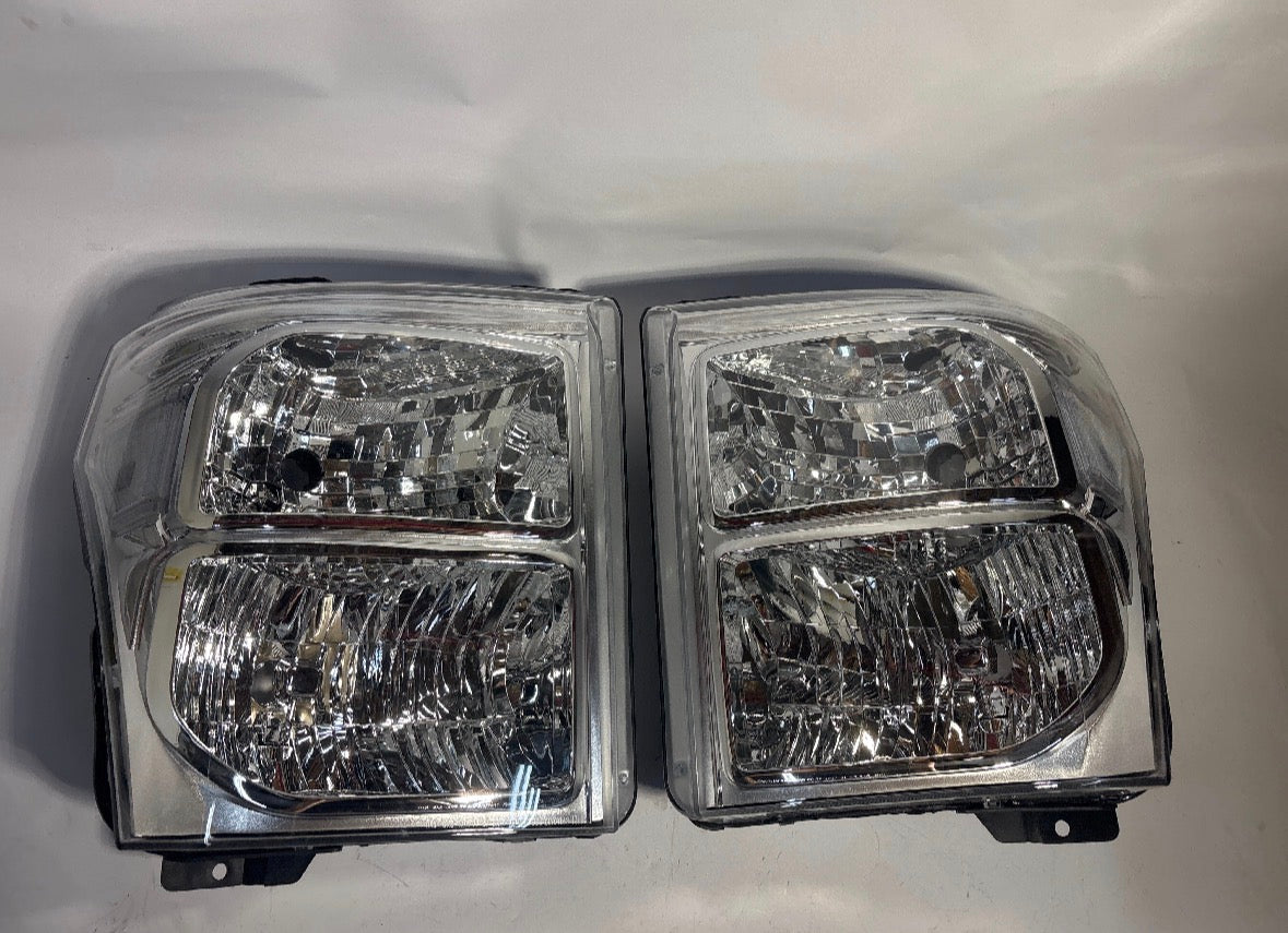 Actual refurbished headlight pair, front view