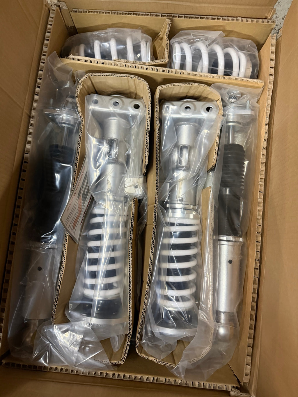 J2 Engineering J2-CO-060-WS white spring suspension kit in original packaging