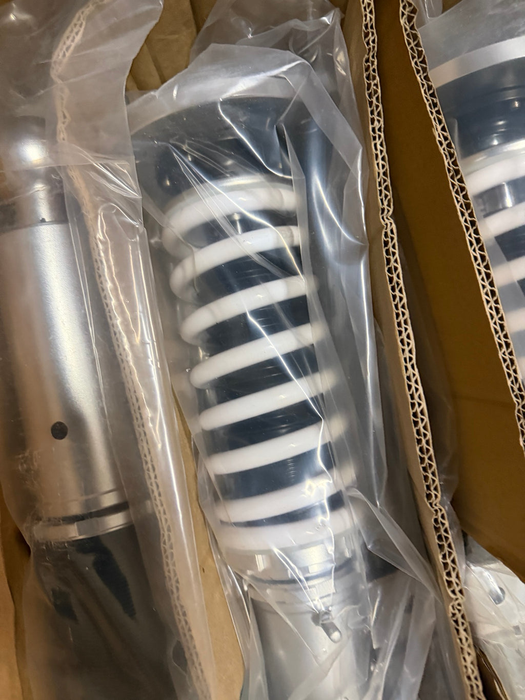 J2 Engineering J2-CO-060-WS white spring suspension kit in original packaging