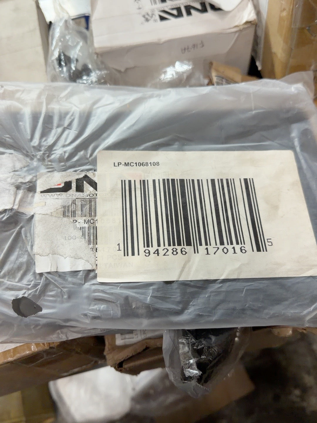 DNA Motoring LP-MC1068108 MINI Cooper Clubman front license bracket in original packaging with SKU label