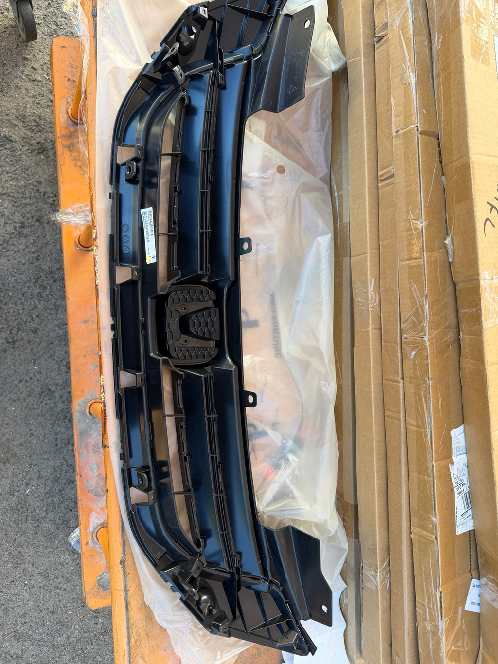 OEM-GR-HO1200213 Honda Accord black grille - actual part rear view and mounting points