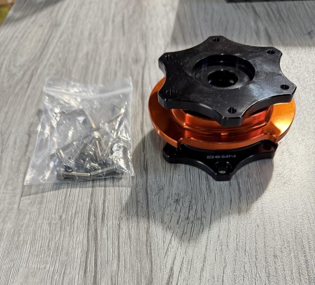 SFI 42.1 SPEC D SHAPED STEERING WHEEL QUICK RELEASE SHORT HUB ADAPTER, 6X70MM BOLT PATTERN BLACK SHINNY BODY/ORANGE SHINNY RING