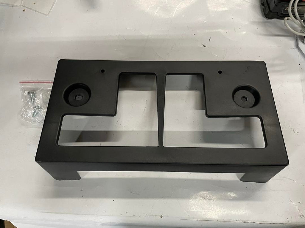 12-16 NISSAN NV1500/ NV2500 / NV3500 FRONT LICENSE PLATE MOUNTING BRACKET