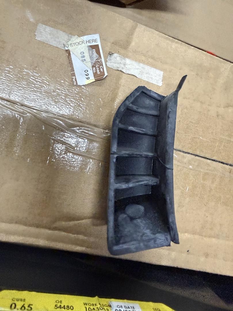front of upper fender bracket