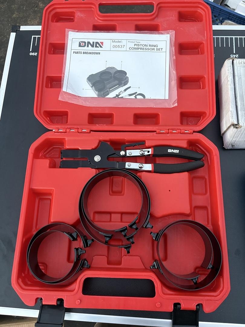 Engine piston ring compressor tool set used to install and remove pistons