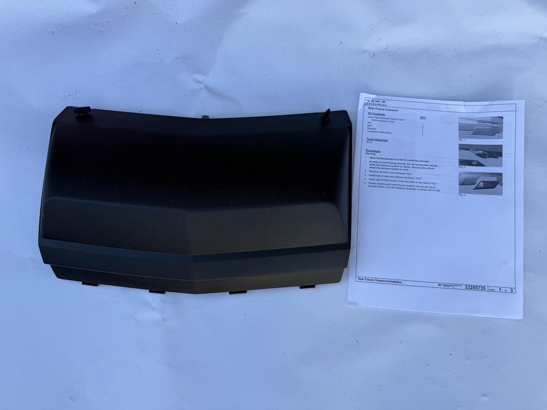 84058072 | 2017-2026 Cadillac XT5 Trailer Hitch Close Out Panel BLACK