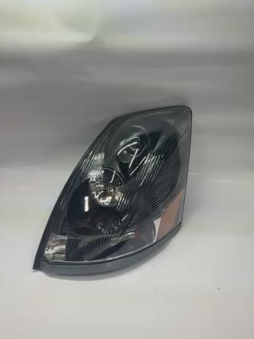 04-17 Volvo VNL Left Driver Side Black Amber Headlight