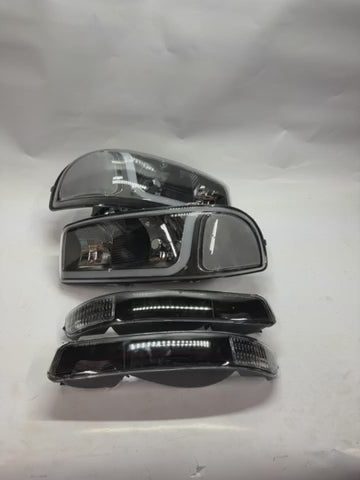 99-06 GMC SIERRA YUKON BLACK HOUSING WITH CLEAR LED