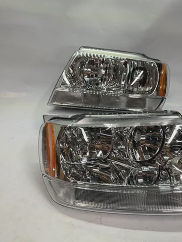 99-04 JEEP GRAND CHEROKEE CHROME HOUSING AMBER CORNER HEADLIGHTS